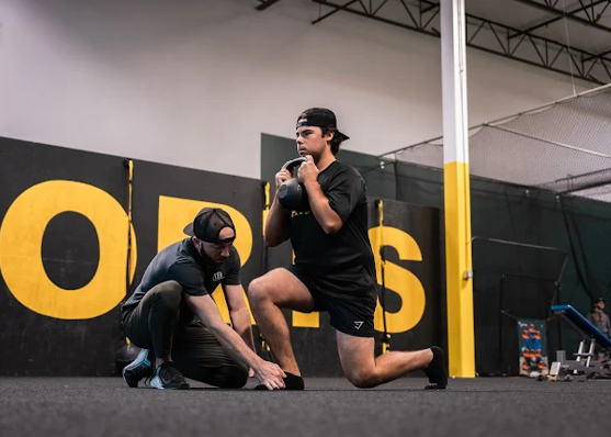 Patient working with a provider at a performance physical therapy clinic in Chicago, IL